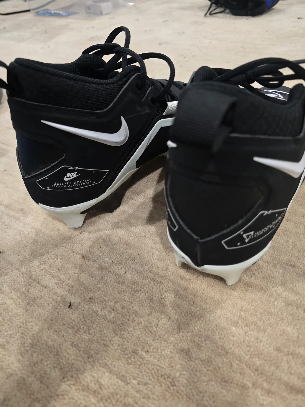 Nike Black and White Alpha Youth Football Cleats